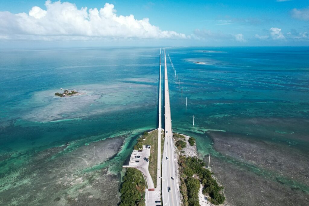 Florida Keys historic bridge over turquoise water — photo by Zoshua Colah on Unsplash